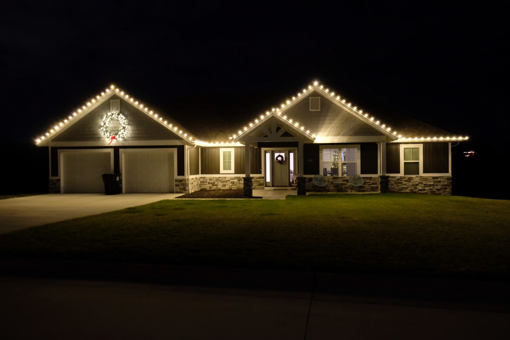 Warm holiday glow lighting on home exterior