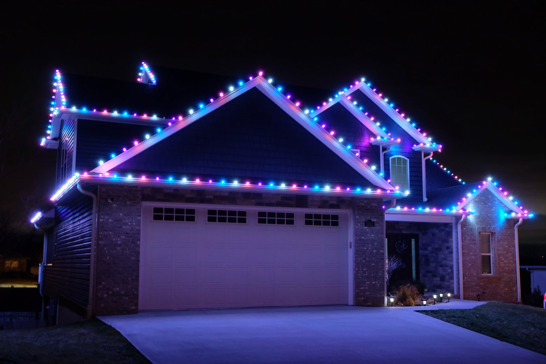 Winter wonderland holiday light display on home