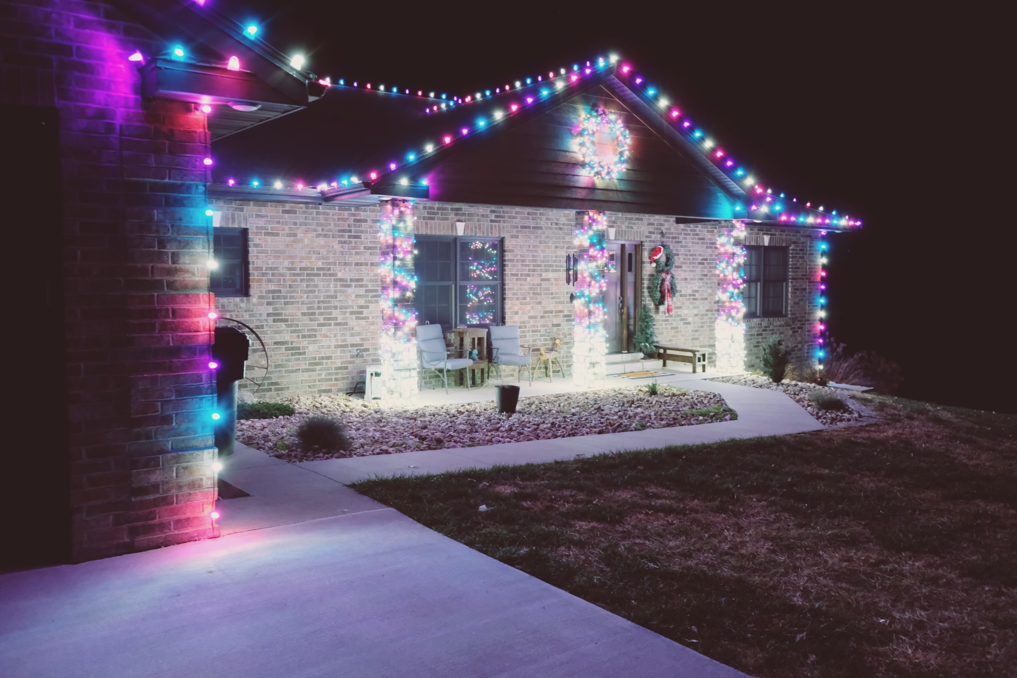 Holiday season showpiece lighting on home exterior