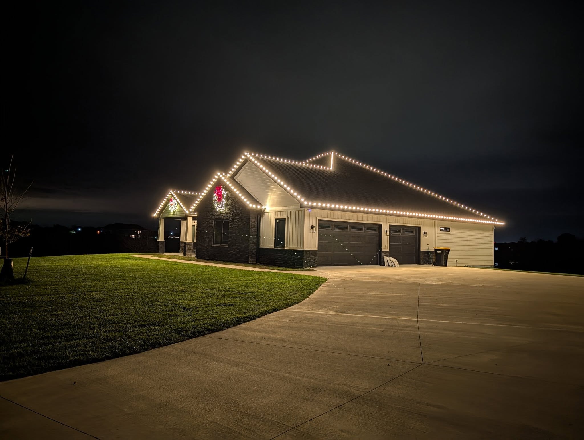 Full exterior festive holiday lighting on home