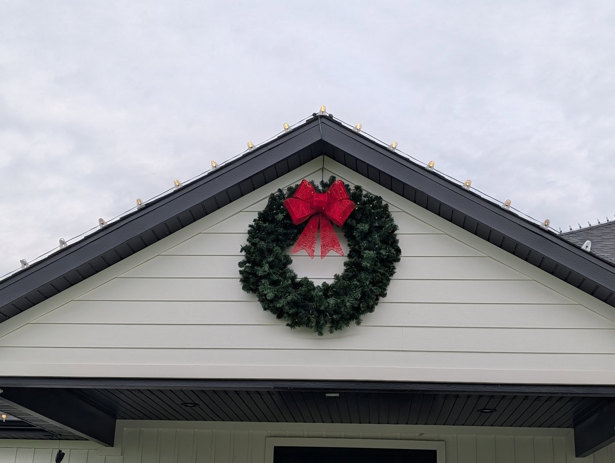 Complete holiday season display on home exterior