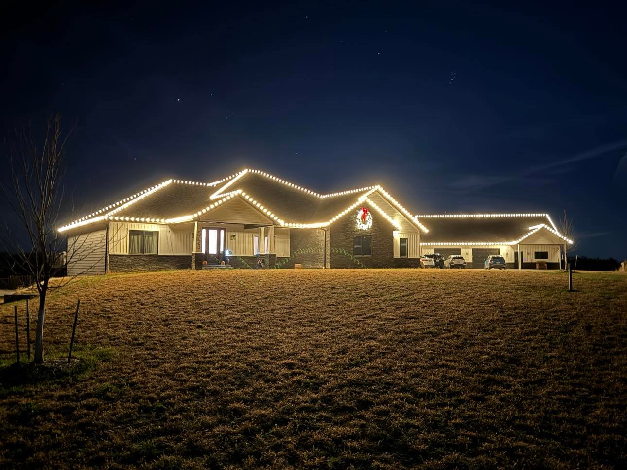 Home with professional holiday lighting curb appeal